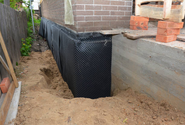 Happy homeowners after waterproofing job in Argos
